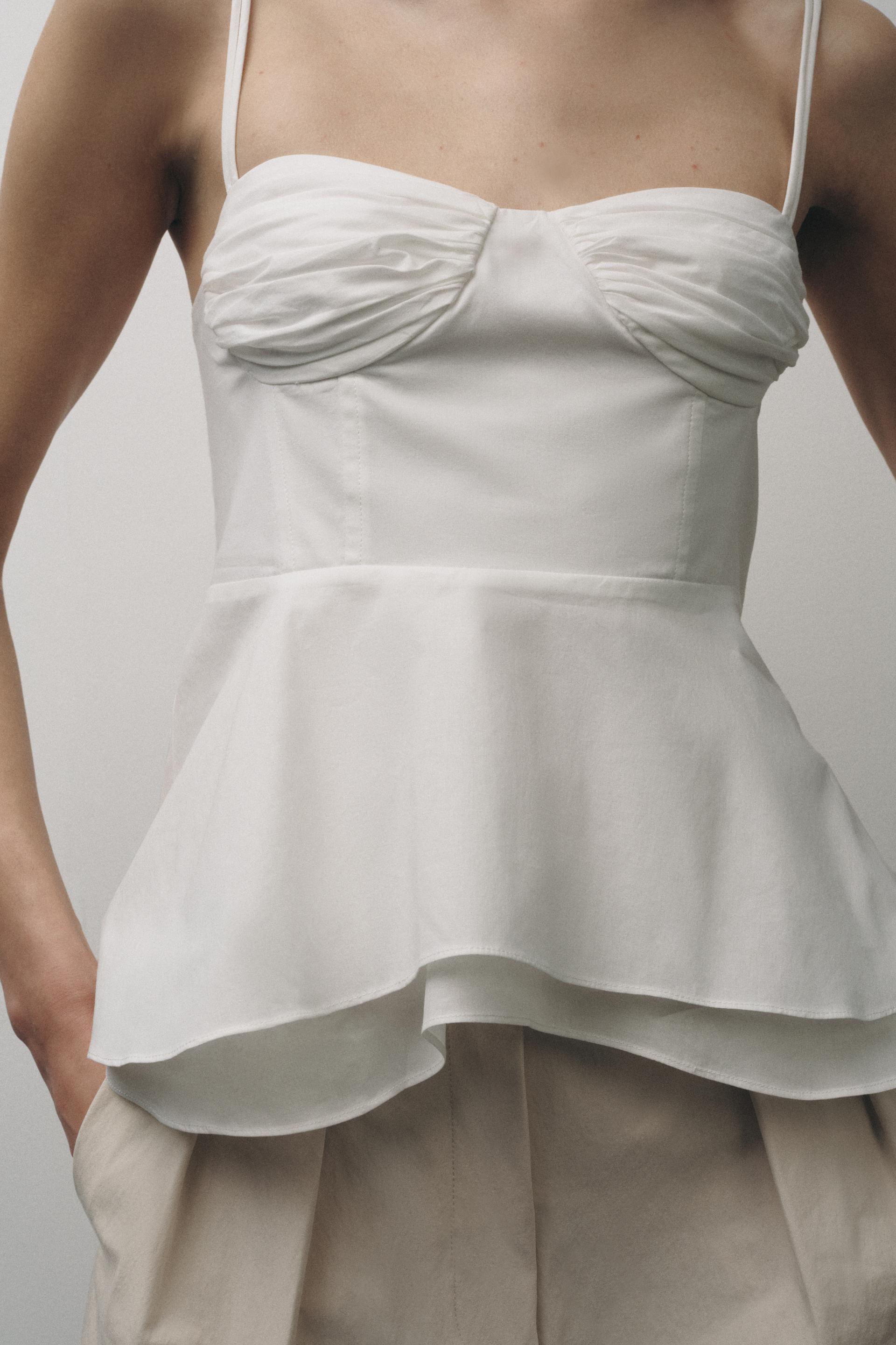SOLITA PEPLUM TOP
