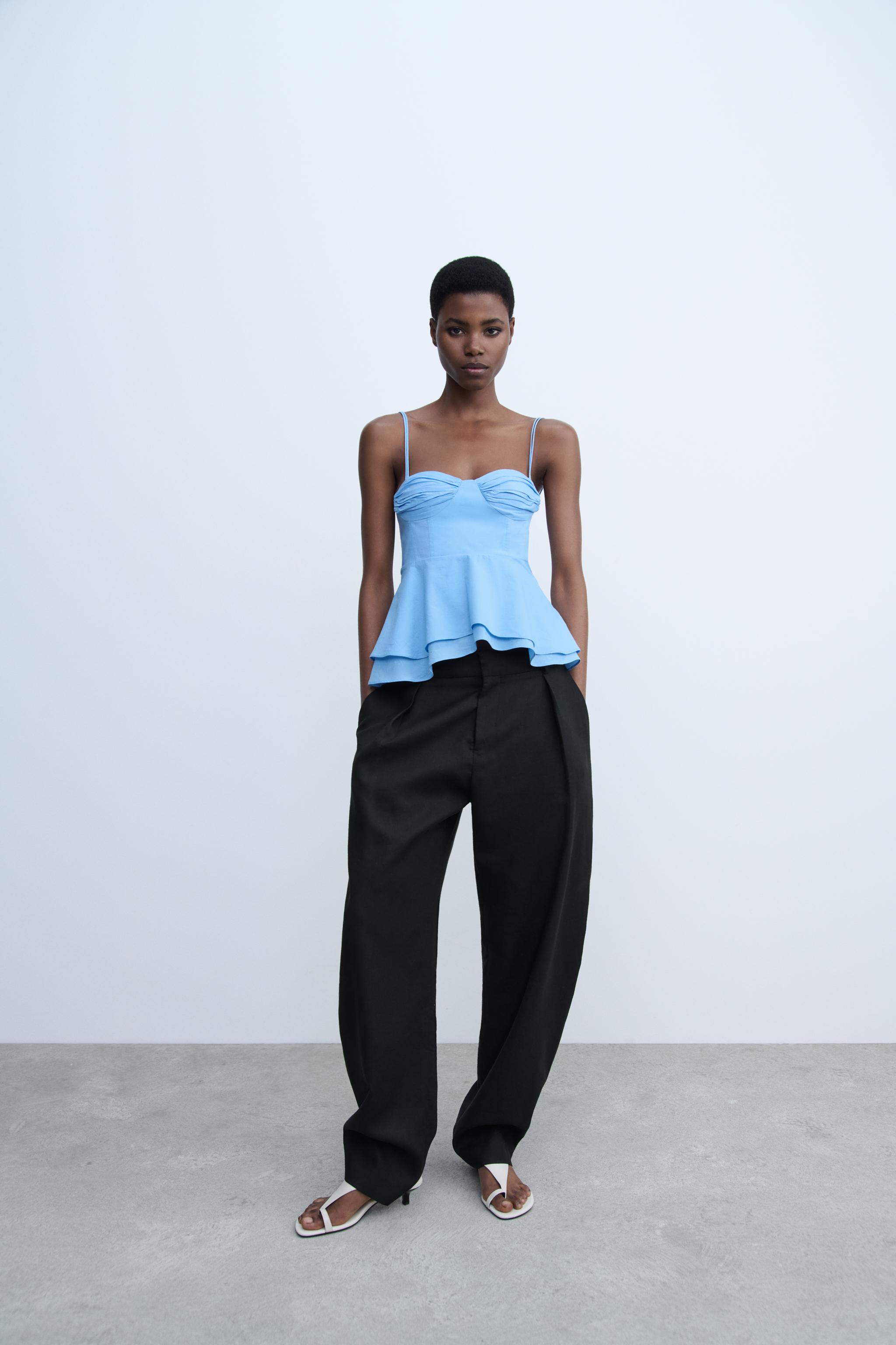 SOLITA PEPLUM TOP
