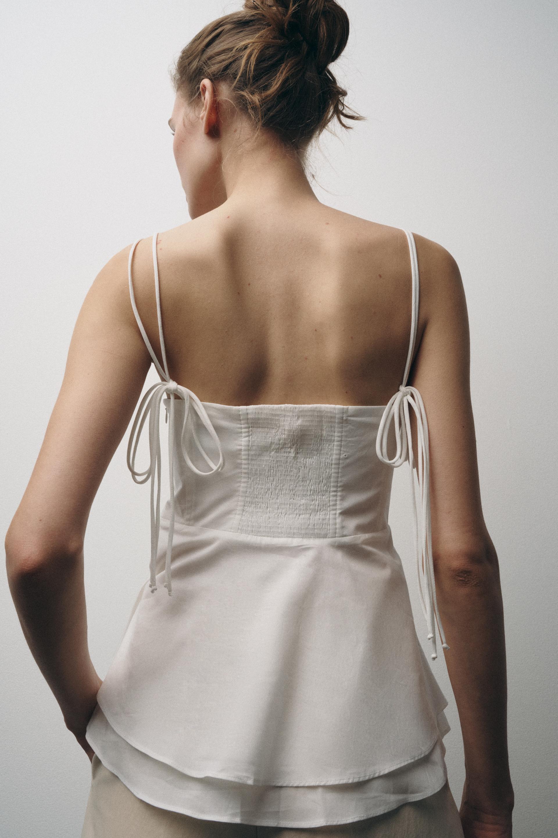 SOLITA PEPLUM TOP