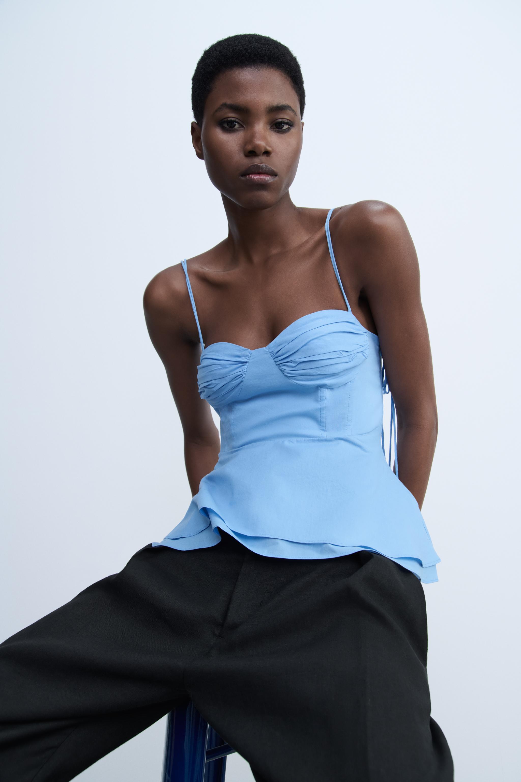 SOLITA PEPLUM TOP