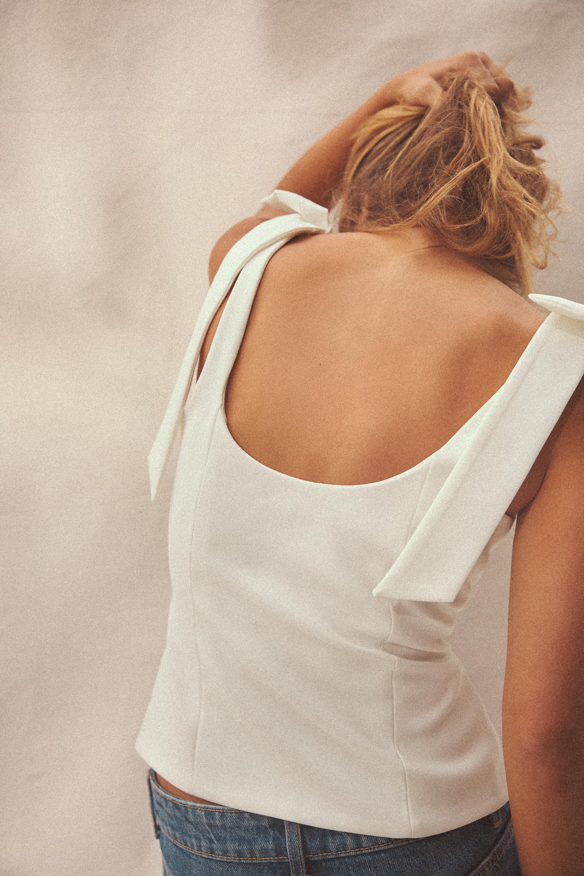 ELYNA STRETCH TOP WITH BOWS