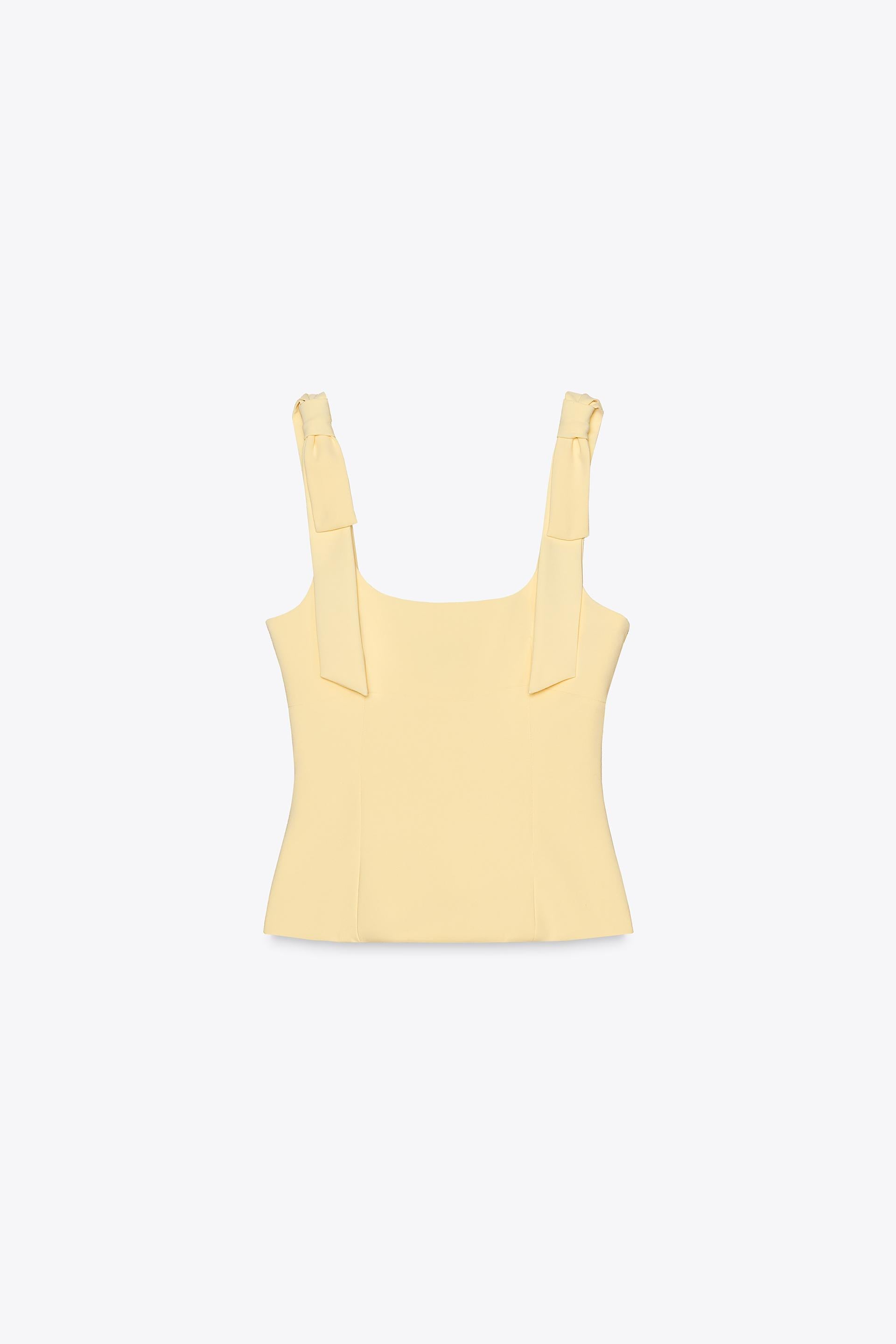 ELYNA STRETCH TOP WITH BOWS